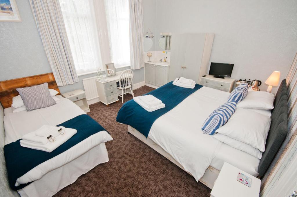 เวฟส์ อิน เบด แอนด์ เบรคฟาสต์ Bed & Breakfast บอร์นมัธ ห้อง รูปภาพ